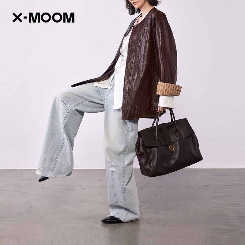 秋季新款水洗破洞镰刀牛仔裤