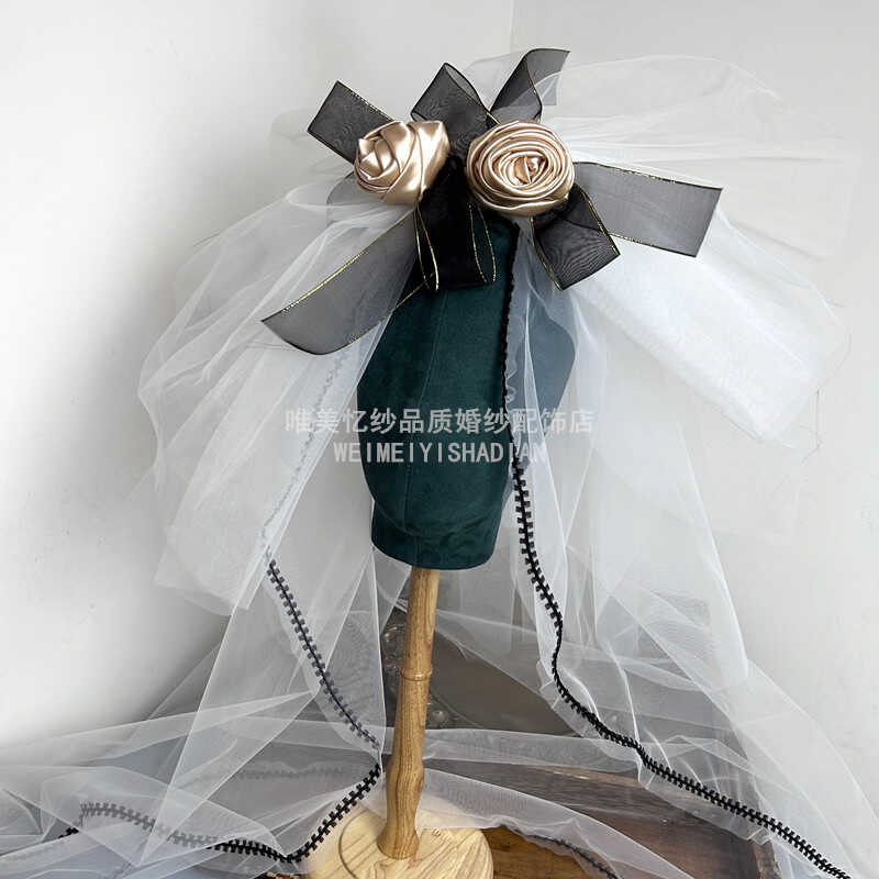 新款超仙黑系蝴蝶结茶花蓬蓬头纱