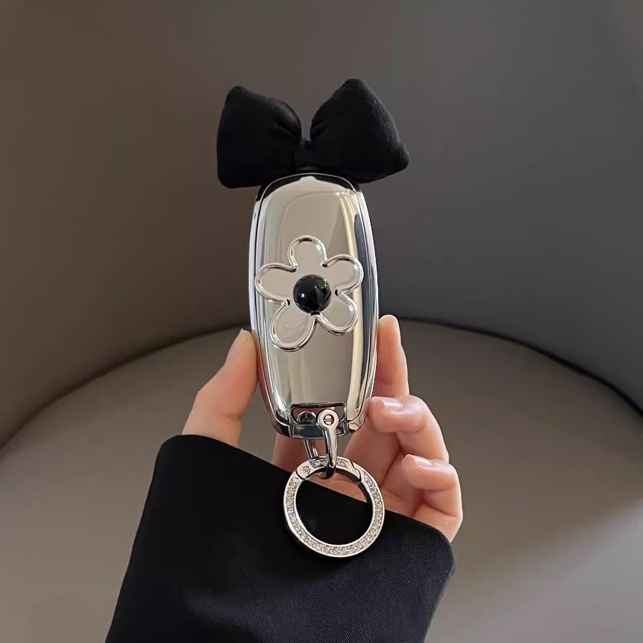 适用2025新款日产奇骏钥匙套东风天籁骐达2键劲客楼兰探陆途乐女