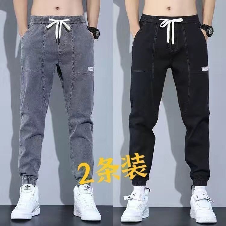 黑色牛仔男款2025新款春秋潮流宽松束脚大码拼接工装哈伦裤子春季