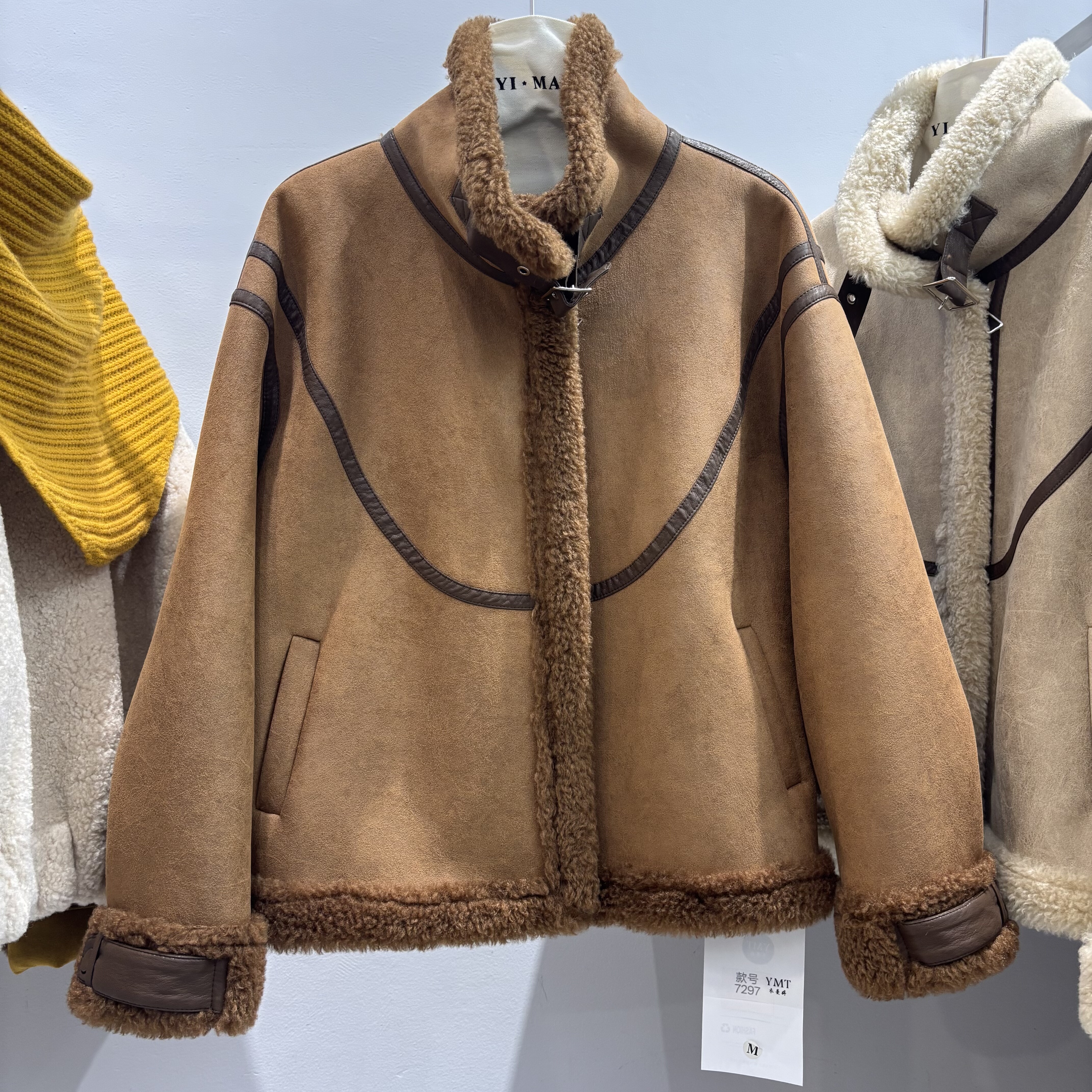 皮毛一体羊羔毛外套女2025冬季新款设计感拼接加厚保暖机车服棉衣