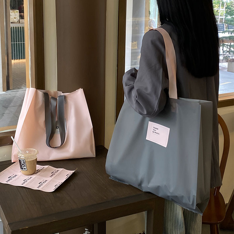 服装店用磨砂手提袋衣服包装打包带购物袋子塑料礼袋加厚现货