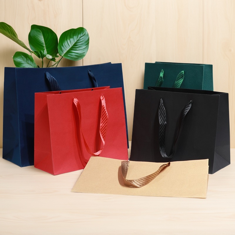 通用红色化妆品礼品袋大号服装牛皮纸袋定做印logo手提袋购物袋