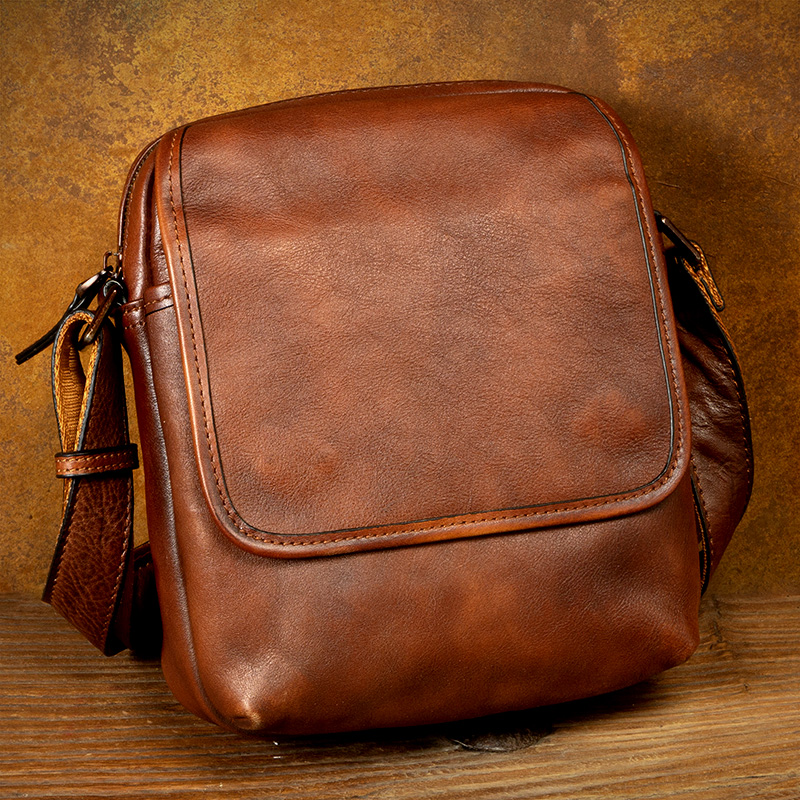 慢时光真皮斜挎包复古手工男包