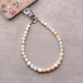 天然贝壳橙珍珠手机挂链温柔奶白贝母串珠挂绳小众高级感包包挂件