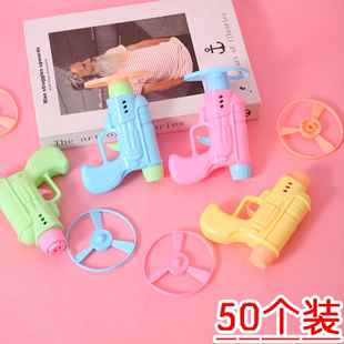 马卡龙手枪竹蜻蜓儿童飞碟枪陀螺地转枪飞天轮玩具地摊热卖小玩具