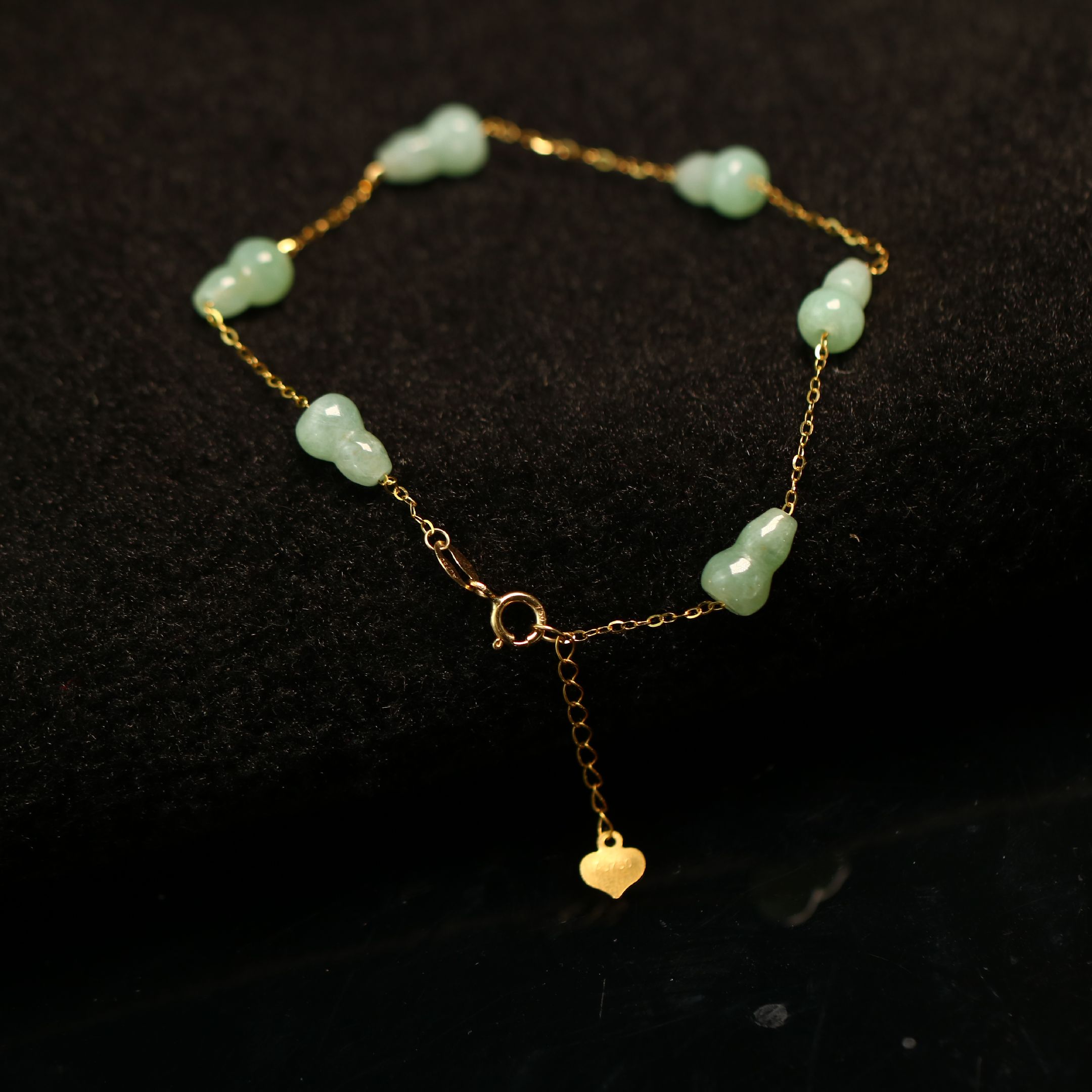 一串18K金镶嵌冰种淡绿色天然A货翡翠葫芦手串手链