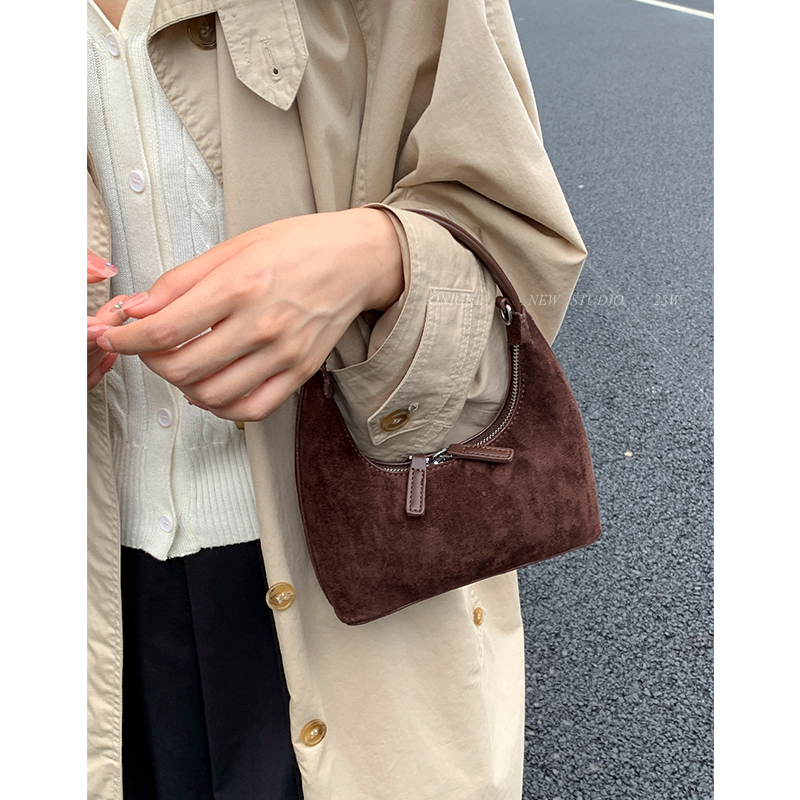 小众复古手提包包女式2025新款秋冬单肩包高级感美拉德斜挎饺子包