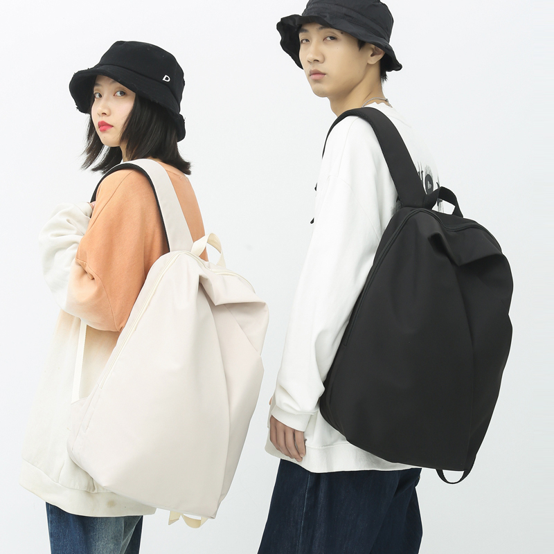 休闲简约大容量背包男初中高中生日韩潮流书包女大学生百搭双肩包