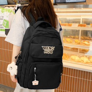 黑色书包女初中生小学生女童4一6年级轻便背包女孩出游旅行双肩包