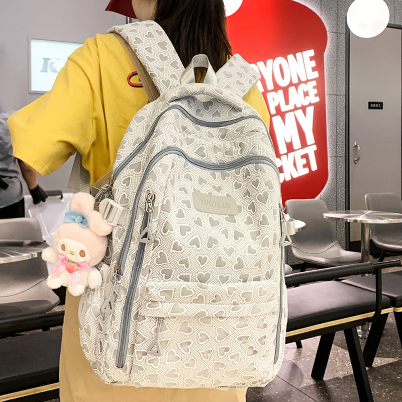 减负护脊轻便大容量学生双肩背包