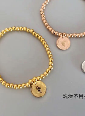 【钛钢不掉色】中国风金币钱币女王人头像幸运招财弹力珠手链女款