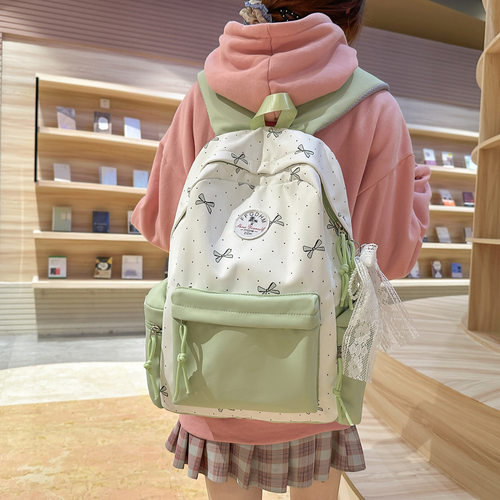 可爱印花书包女小众蝴蝶结初高中学生大容量背包时尚小清新双肩包