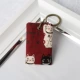 Маленький бордовый брелок