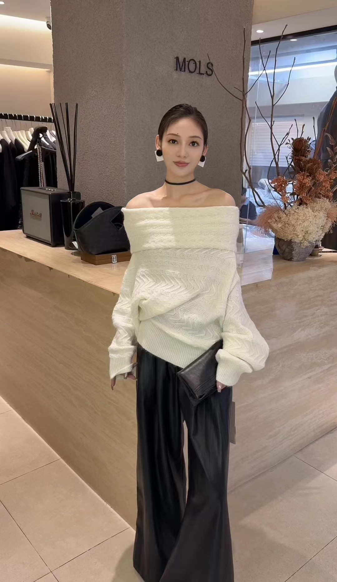 MOLS翻领针织衫女2025秋冬新慵懒风不规则下摆斜边设计套头毛衣