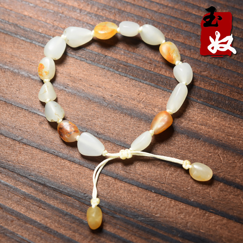 新疆和田地区天然和田玉/洒金皮原皮原孔籽料原石手串/12.55克
