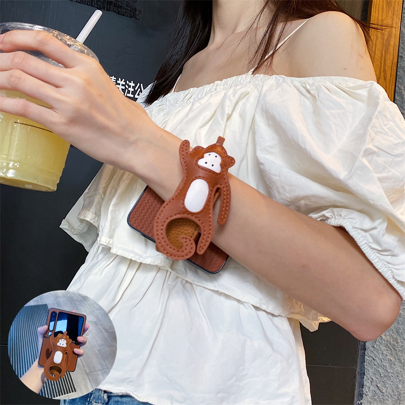 卡通猴子皮革手腕带适用小米mixflip2手机壳三星zflip7小折叠屏6/5新款vivoxflip摩托罗拉60ultra编织纹硬壳