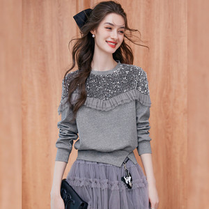 秋冬季实拍拼接亮片装饰时尚风休闲气质圆领底摆开叉长袖卫衣女装