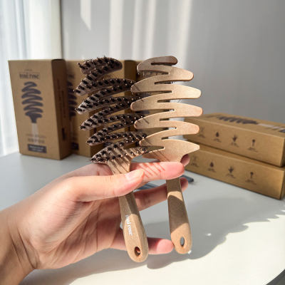 多段式弧形齿列猪鬓毛松塔梳