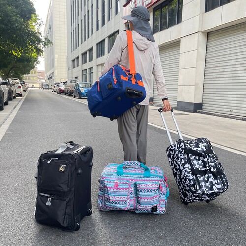 美单拉杆手提多用大容量旅行袋