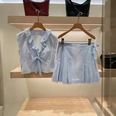 法式小众2025春夏新款度假风蓝色条纹荷叶边V领衬衫+半身裙套装