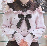 A Japanese spring bestseller, a mass-produced off-the-shoulder sweater with embroidered heart-shaped lace straps, is being cleared from the warehouse thumbnail 2