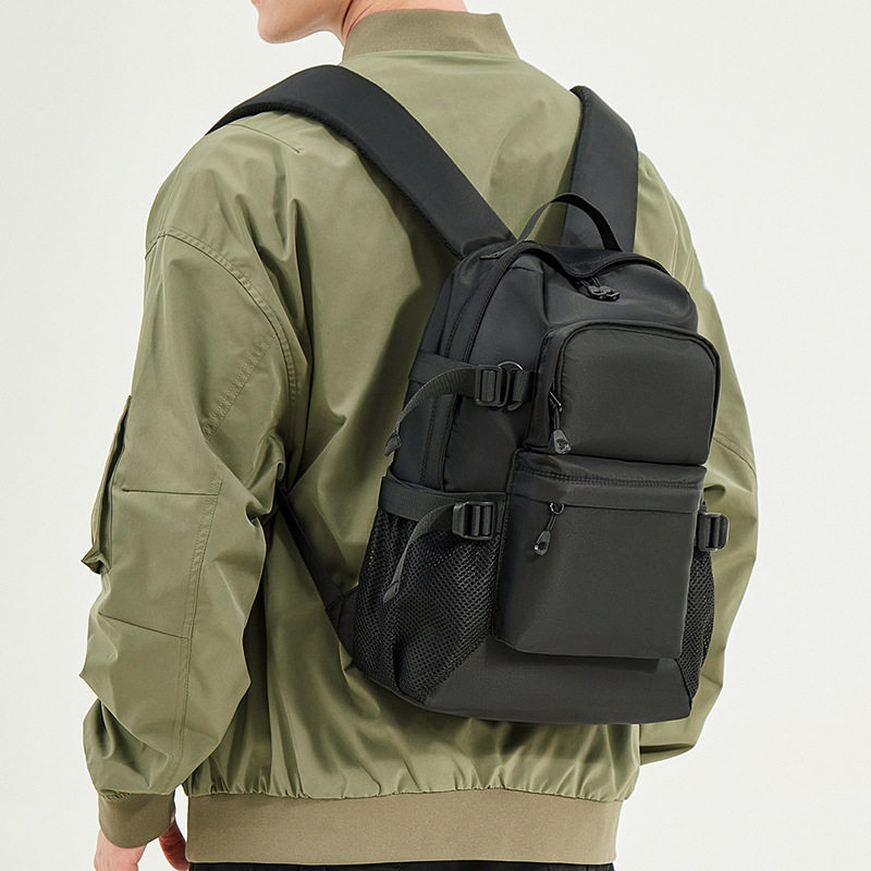 户外出行短途旅游男士双肩包大容量防水黑色背包学生书包便携装袋