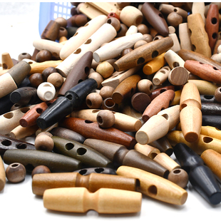 橄榄形木质纽扣单孔两孔木头扣箱包服装装饰童装牛角扣子混装称斤