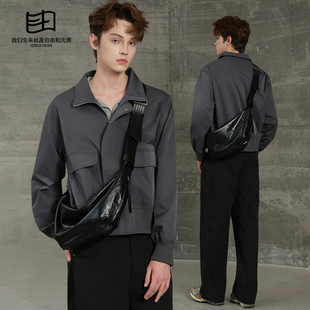 2026新款小众设计师饺子包潮牌胸包真皮斜挎包可颂牛角包男包大包