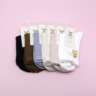 西客优品 冬莫代尔蝴蝶结刺绣纯色无骨中筒学生成人女袜252Q2617
