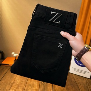 牛仔裤男款新款秋冬薄款2025纯黑色弹力修身小脚不易掉色潮牌长裤