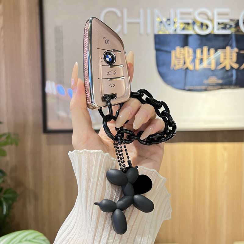 适用宝马3系钥匙套325li刀锋5系x1x2x3x5包2系i3三系甜酷流沙粉女