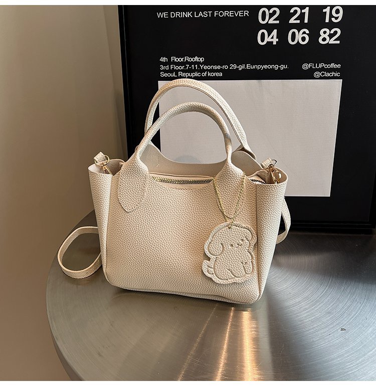 简约休闲手提包包女式2025新款时尚百搭单肩包通勤百搭斜挎水桶包