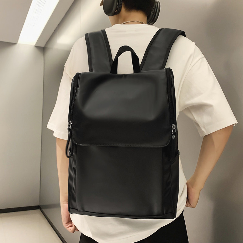 PU翻盖拉链式双肩包男高中大学