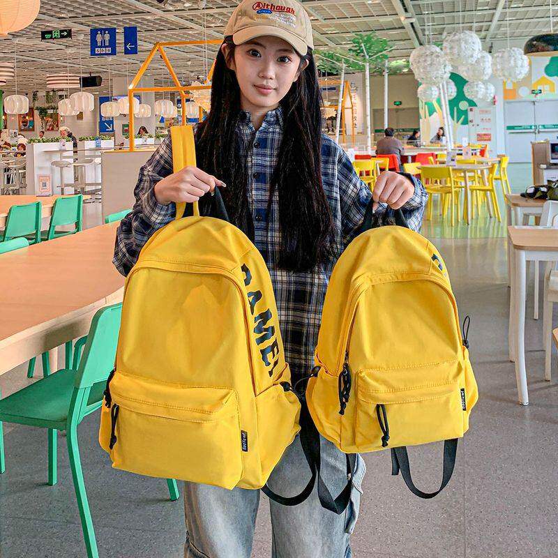 学生轻便书包简约百搭字母大容量日系双肩包旅游纯色校园通勤背包