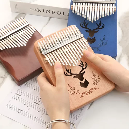 手指琴卡林巴琴乐器巴可弹奏桃花芯初学者kalimba钢琴17拇指琴音