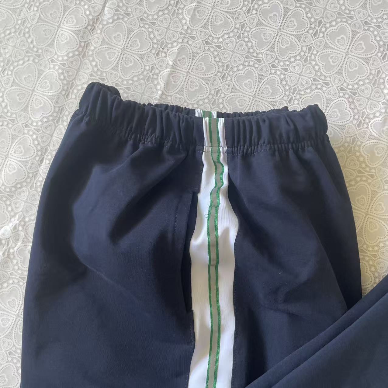 中小学生藏蓝拼白条校服裤定制