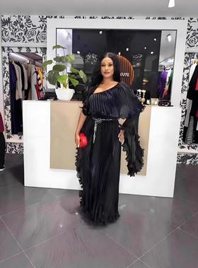 Oversized dress with sloping shoulders, banquet evening