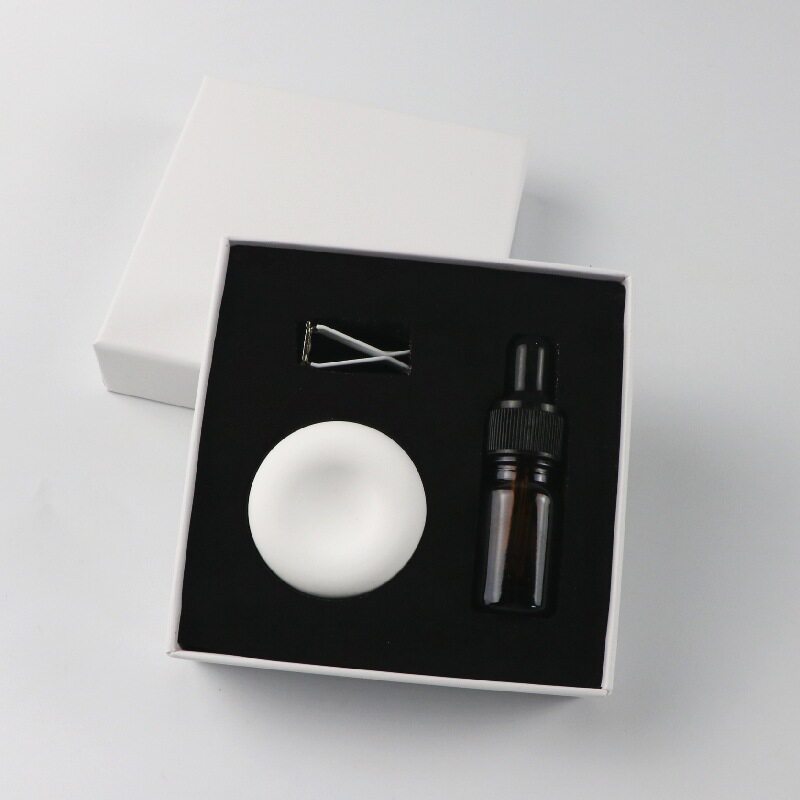 白色圆形创意车载香薰出风口石膏香水散香石扩香便携车载香薰