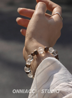 水晶檀木圆球手链女手串纯银高级感轻奢小众简约弹力2026年新款