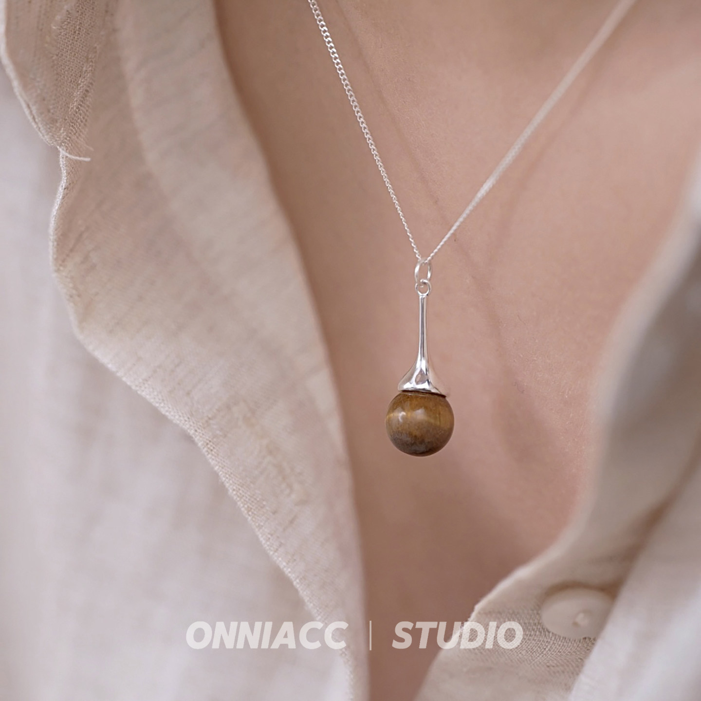 琥珀猫眼石水滴项链女锁骨链纯银高级感轻奢小众简约2026年新款