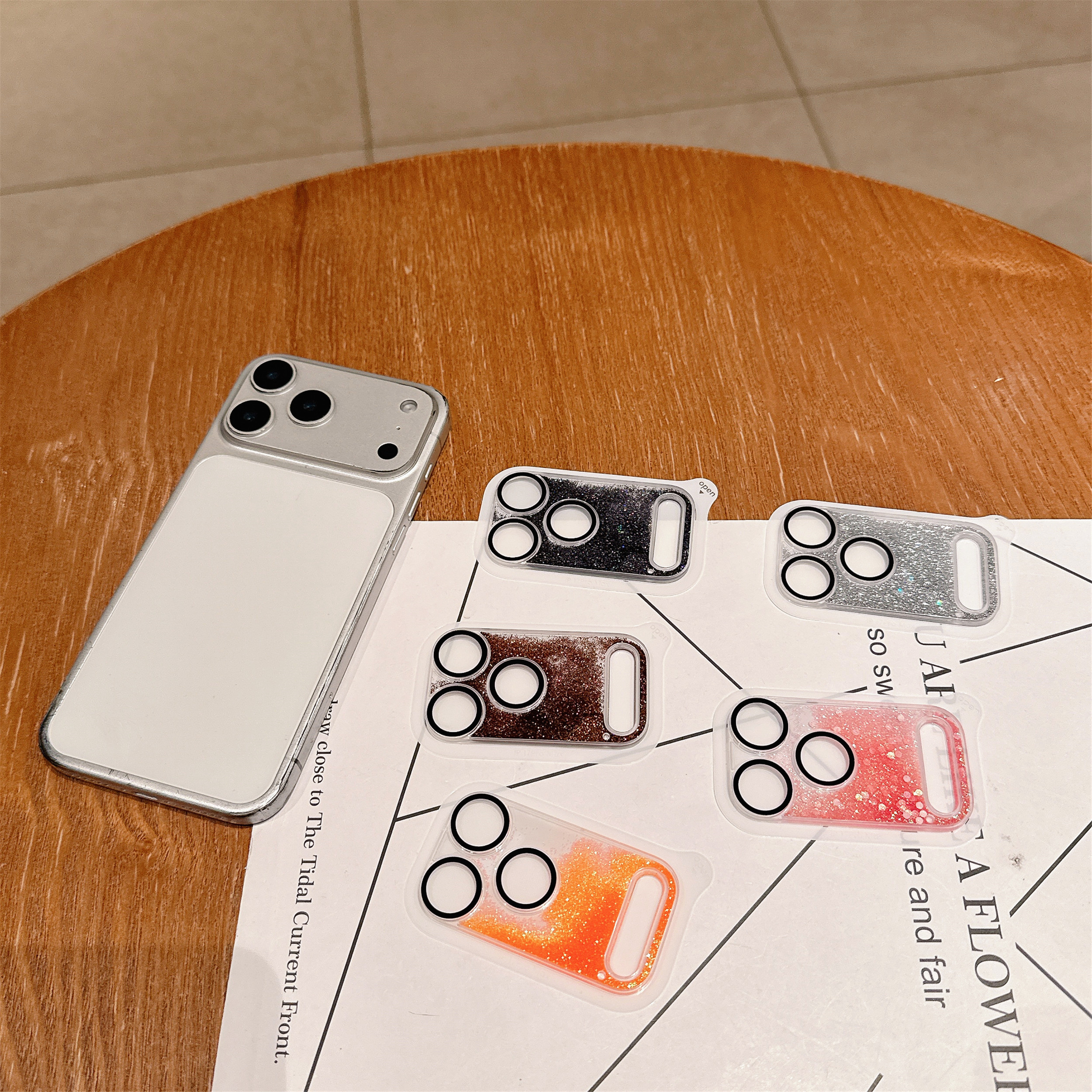 iPhone17ProMax一体流沙镜头膜