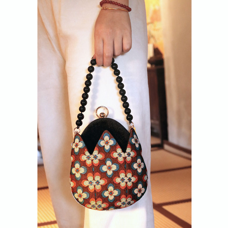 KK9迷你水滴口金包手提包女包邮