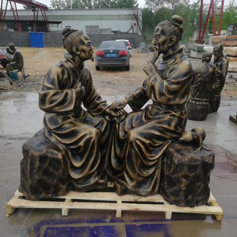 玻璃钢设定制老中医号脉看病雕塑