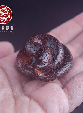 海南黄花梨紫油梨蛇把件