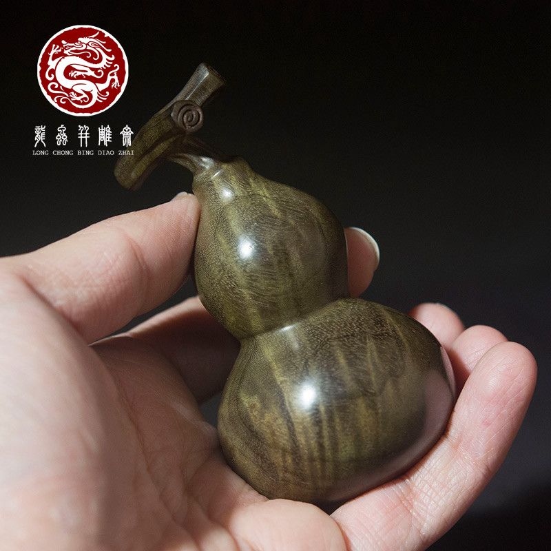 阴沉金丝楠木石争亲作葫芦手把件