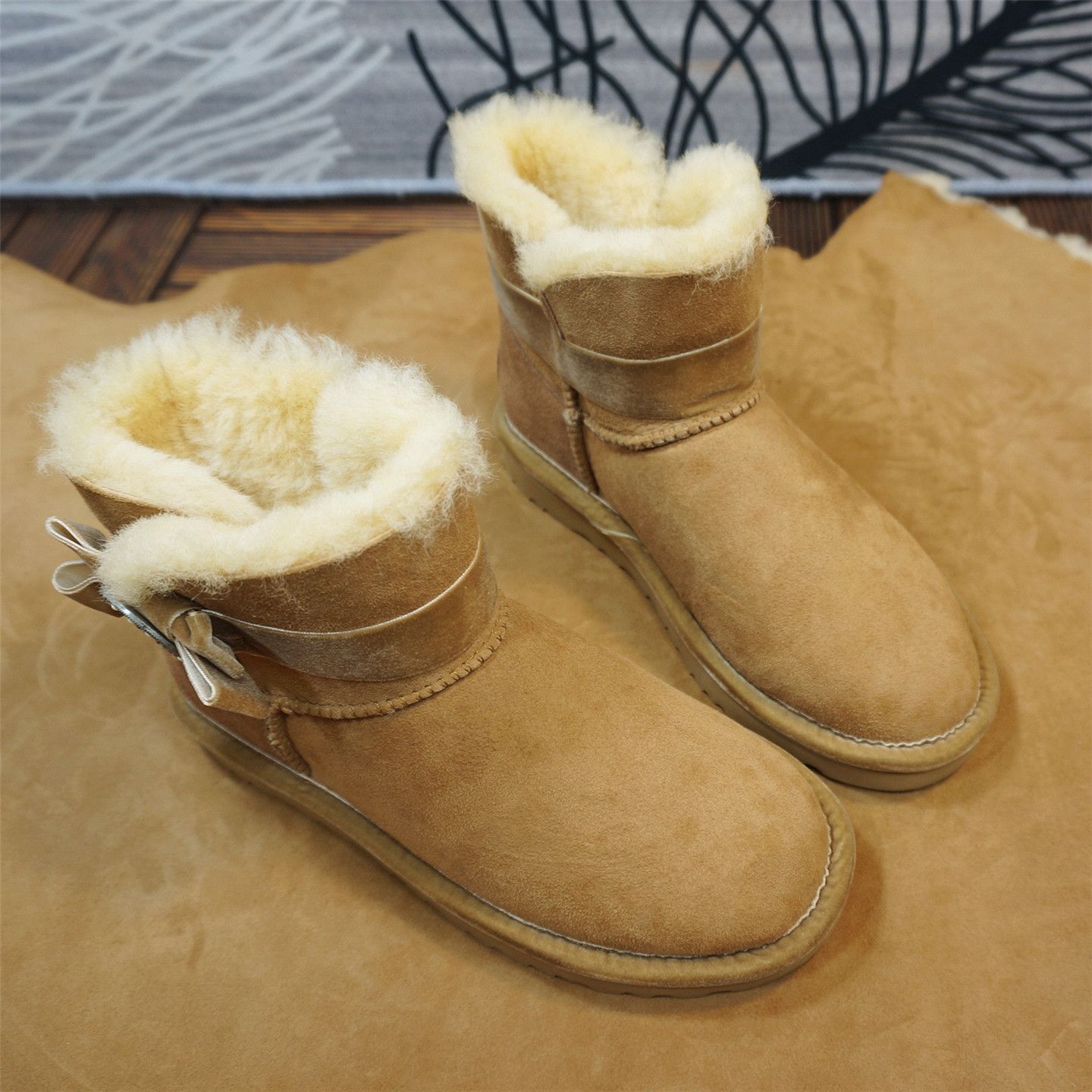 87-2短筒靴羊皮毛一体女士雪地靴套筒靴皮带扣时尚棉靴冬季保暖