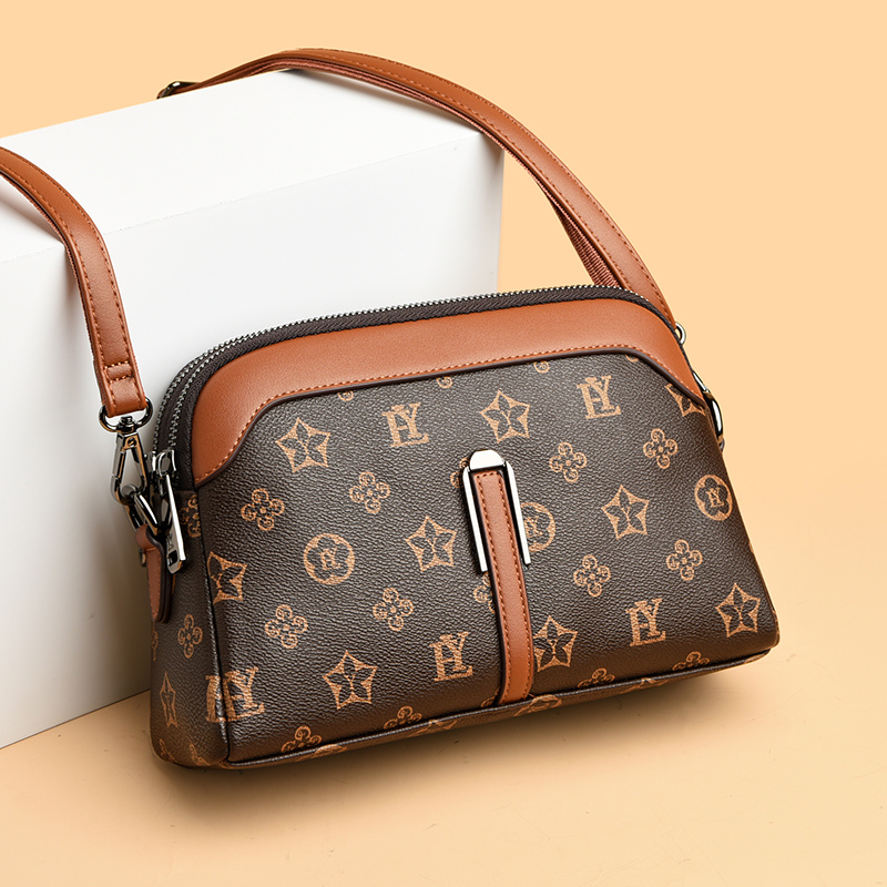 真皮女包包2024新款斜挎包女单肩高级感小众女士圆筒牛皮时尚女包