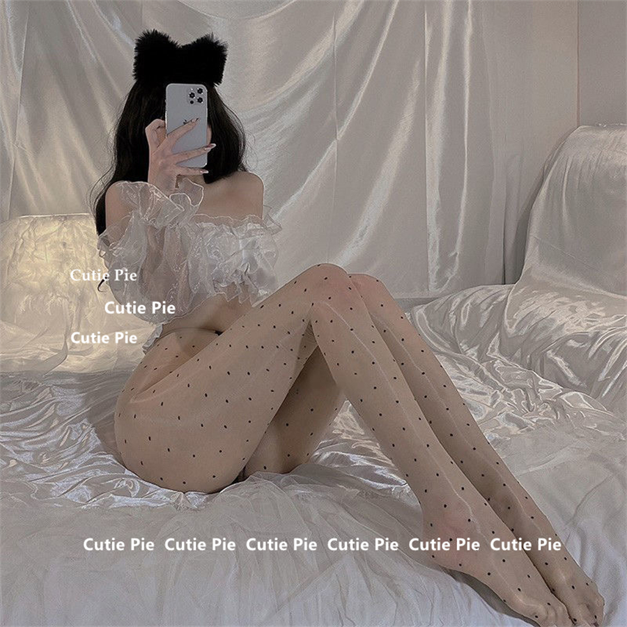 性感波点水光马油亮丝袜女