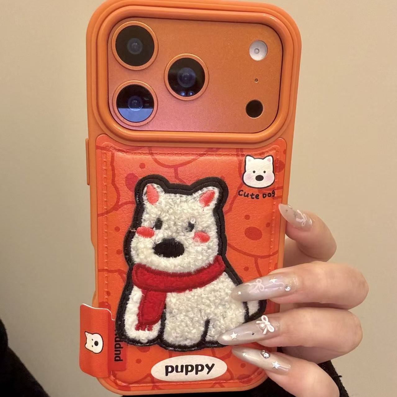 可爱橙底鼓包皮纹刺绣西高地猫咪适用ihone17promax苹果16p手机壳